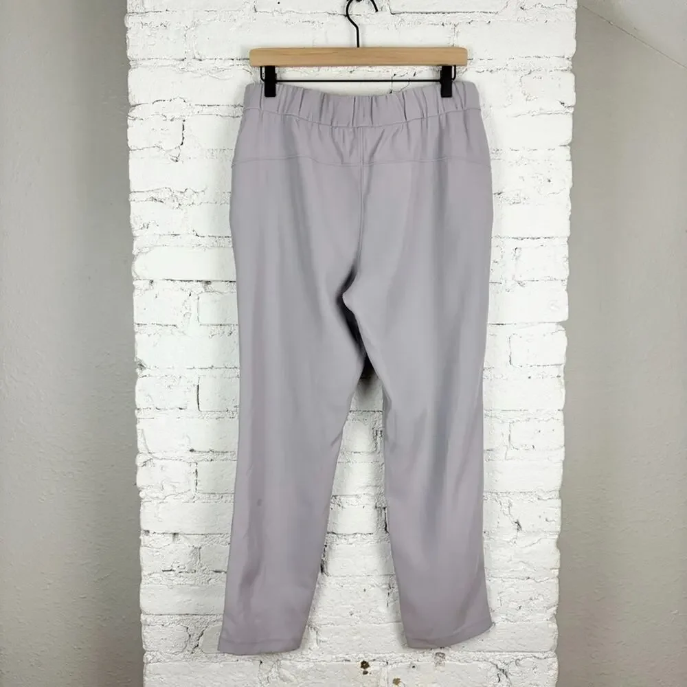 Lululemon On the Fly 7/8 Pants Woven Carbon Dust Tan Grey 8